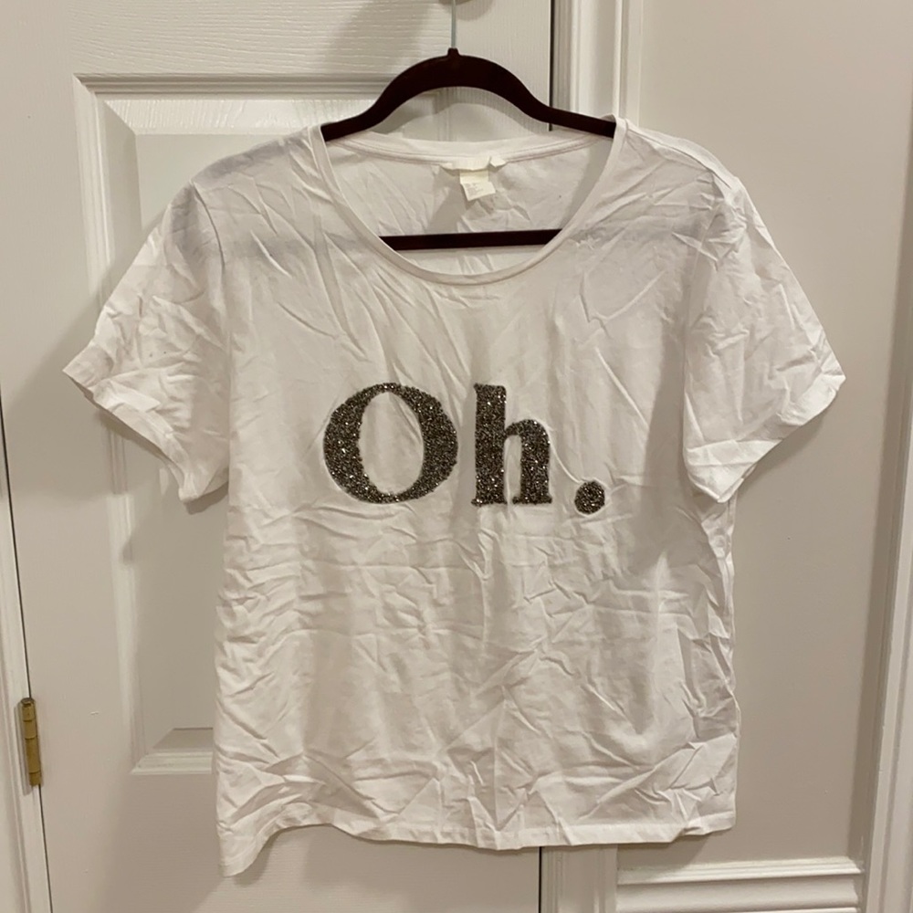“Oh.” H&M tee